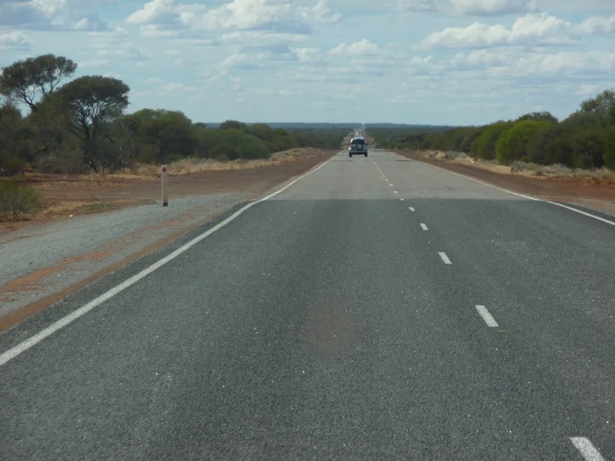 The long straight road through Kumarina's remote outback