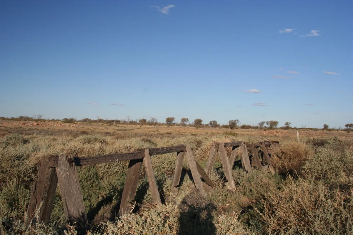 Weathered fence posts tell stories of outback history