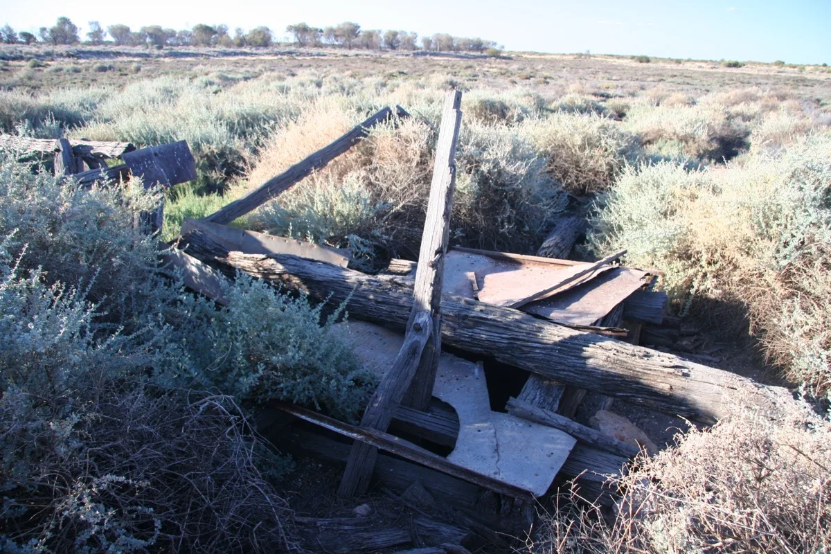 Nature reclaims forgotten outback structures in the scrubland