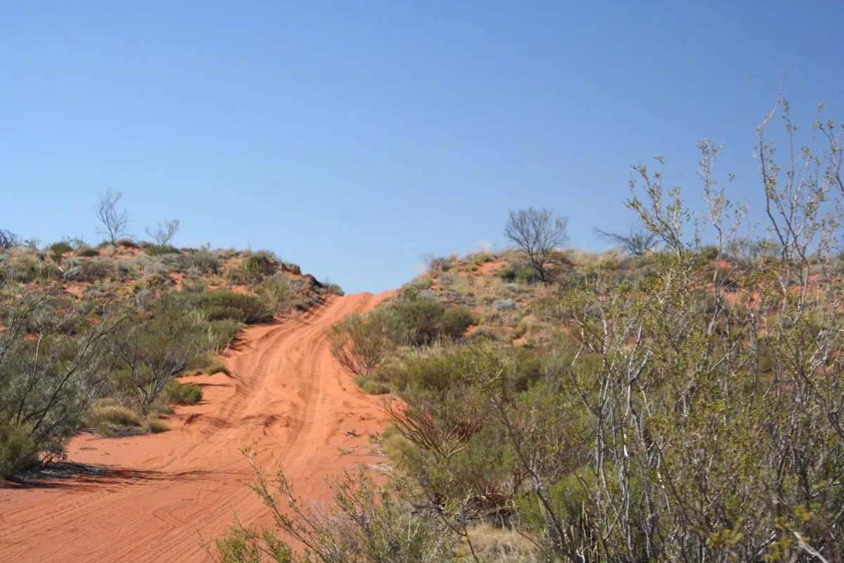 Undulating red dirt tracks challenge adventurous outback caravanners