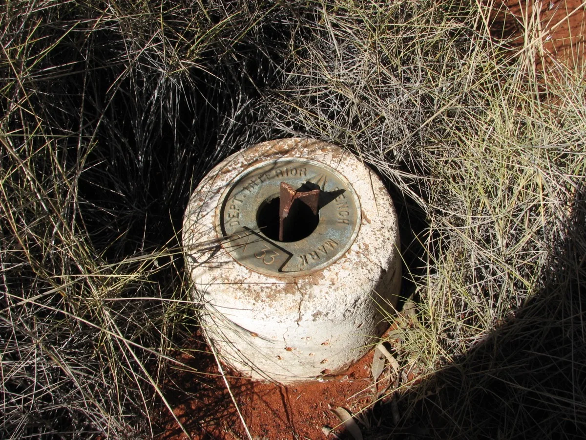 Historic bore marker among spinifex in remote Australia