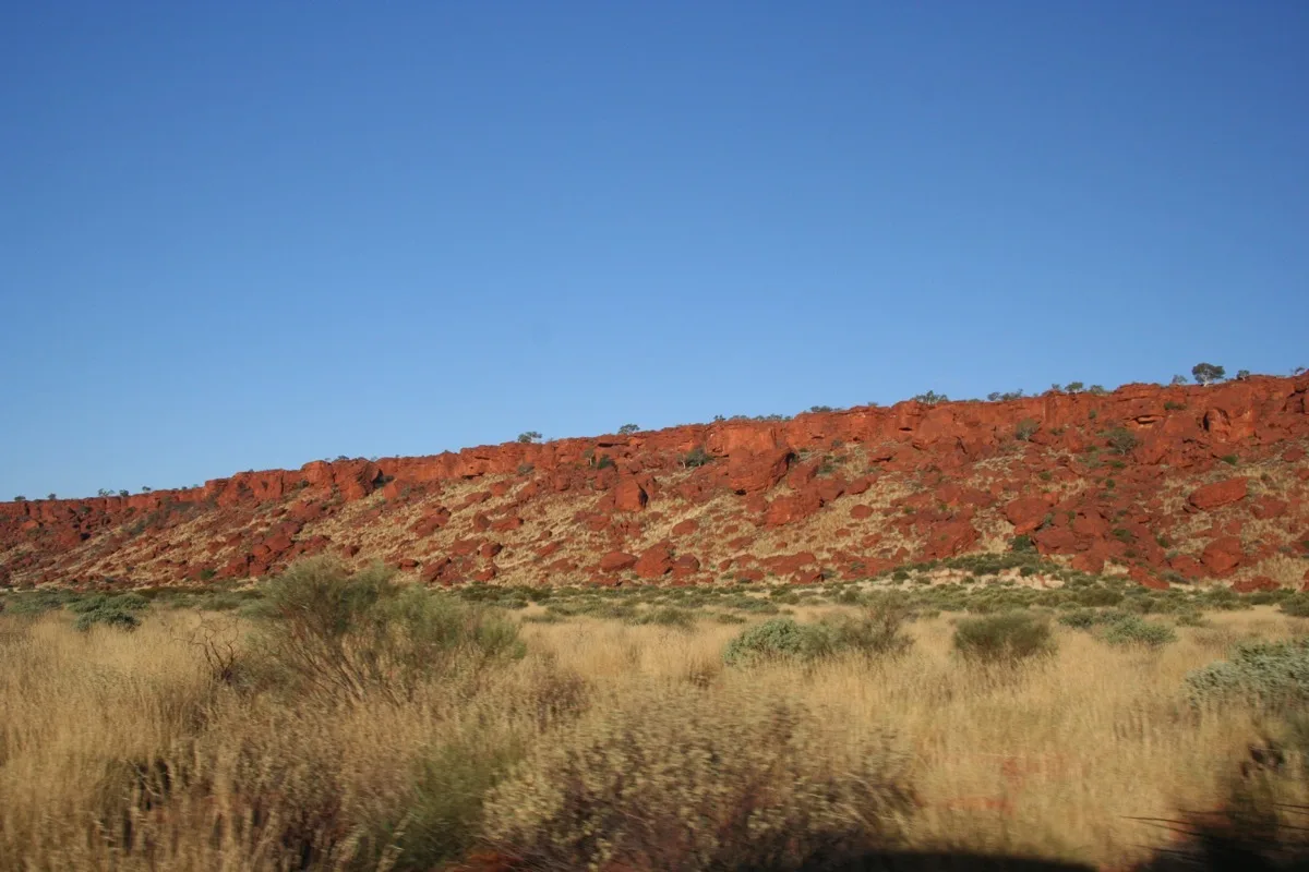 Endless red ridgelines define the remote outback horizon