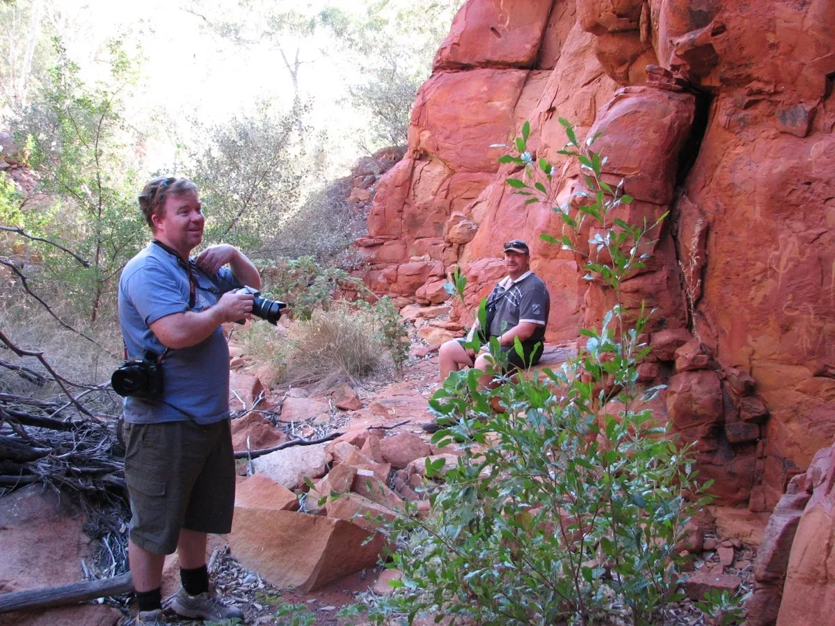 Photographing ancient rock formations in the red center
