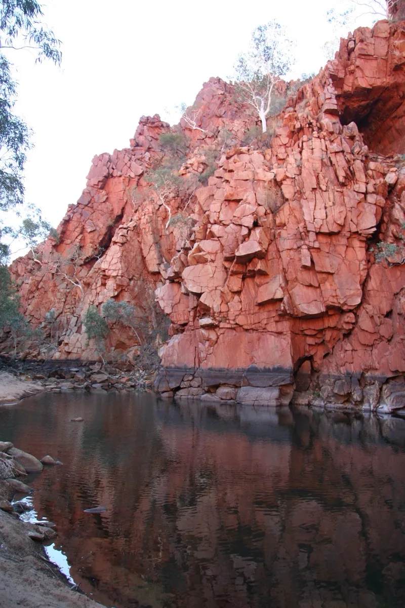 Red rock reflections at a hidden outback gorge