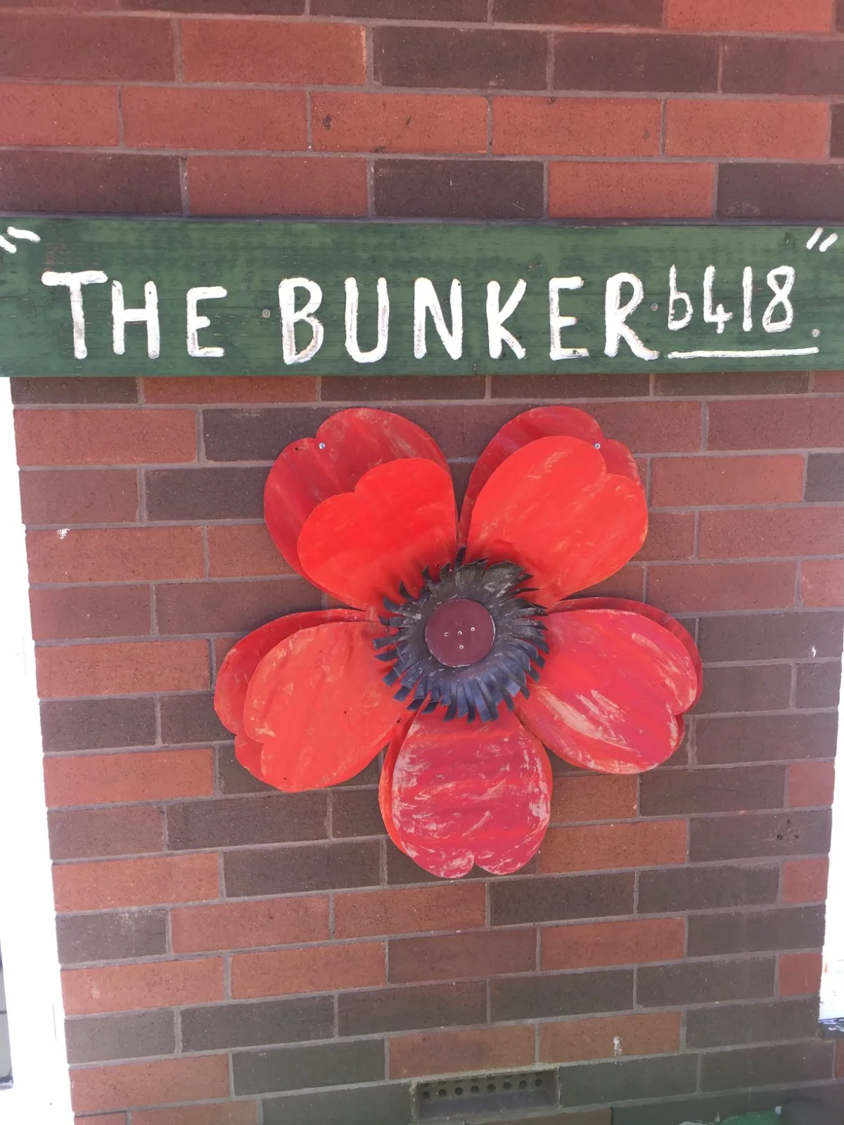 The Bunker memorial with remembrance poppy art
