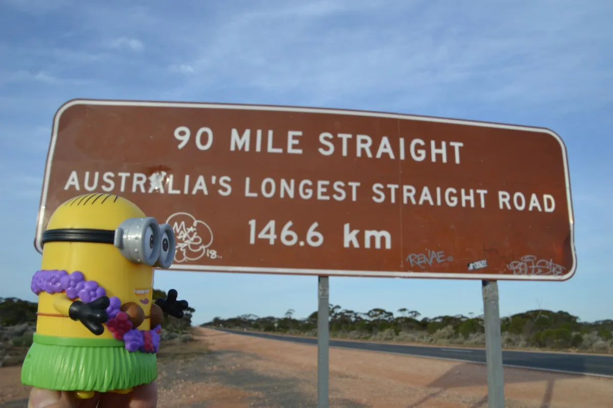 Standing at Australia's longest straight road - 90 Mile Straight