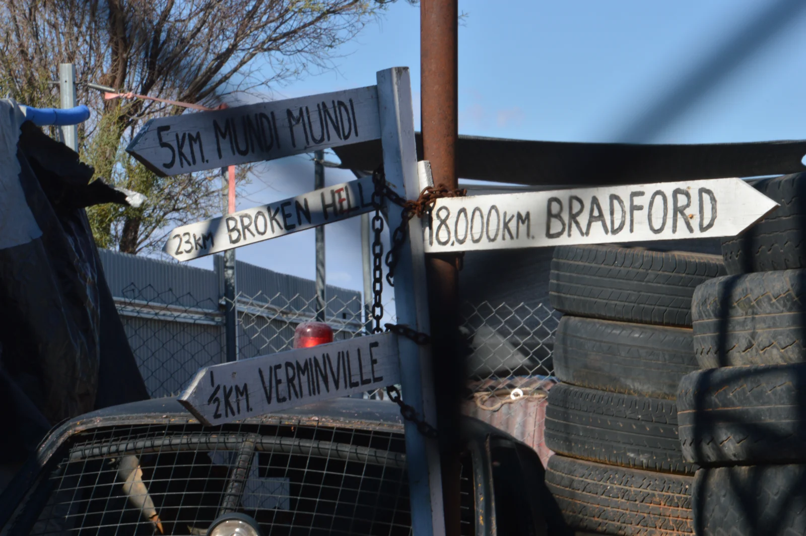 Outback signpost shows the vast distances of inland Australia