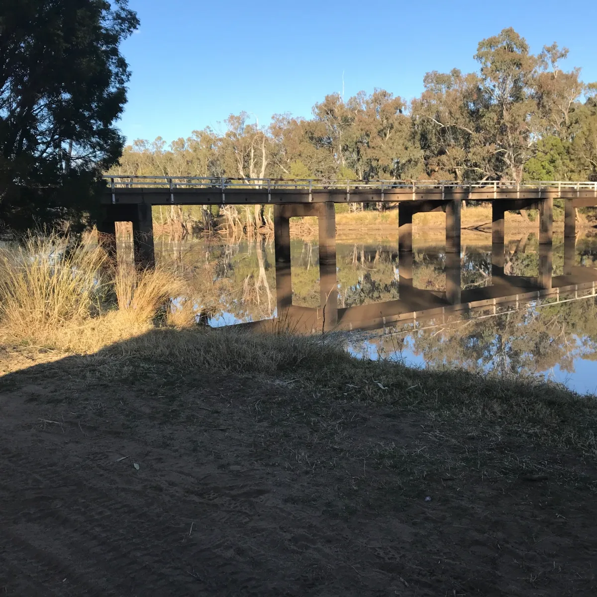 Warroo Bridge's perfect reflections at sunset near St George