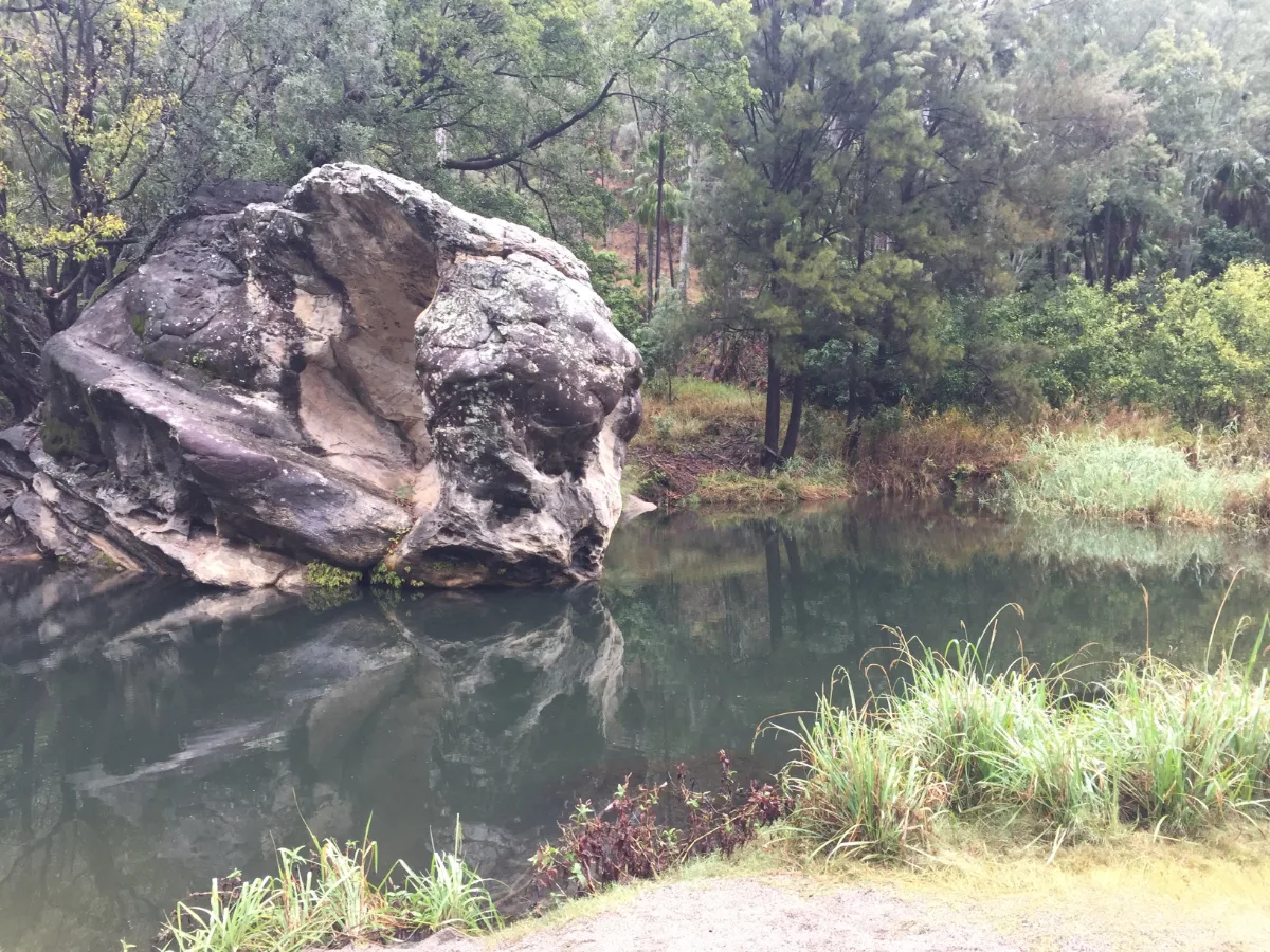 The Rock Pool, reflecting the somber sky.