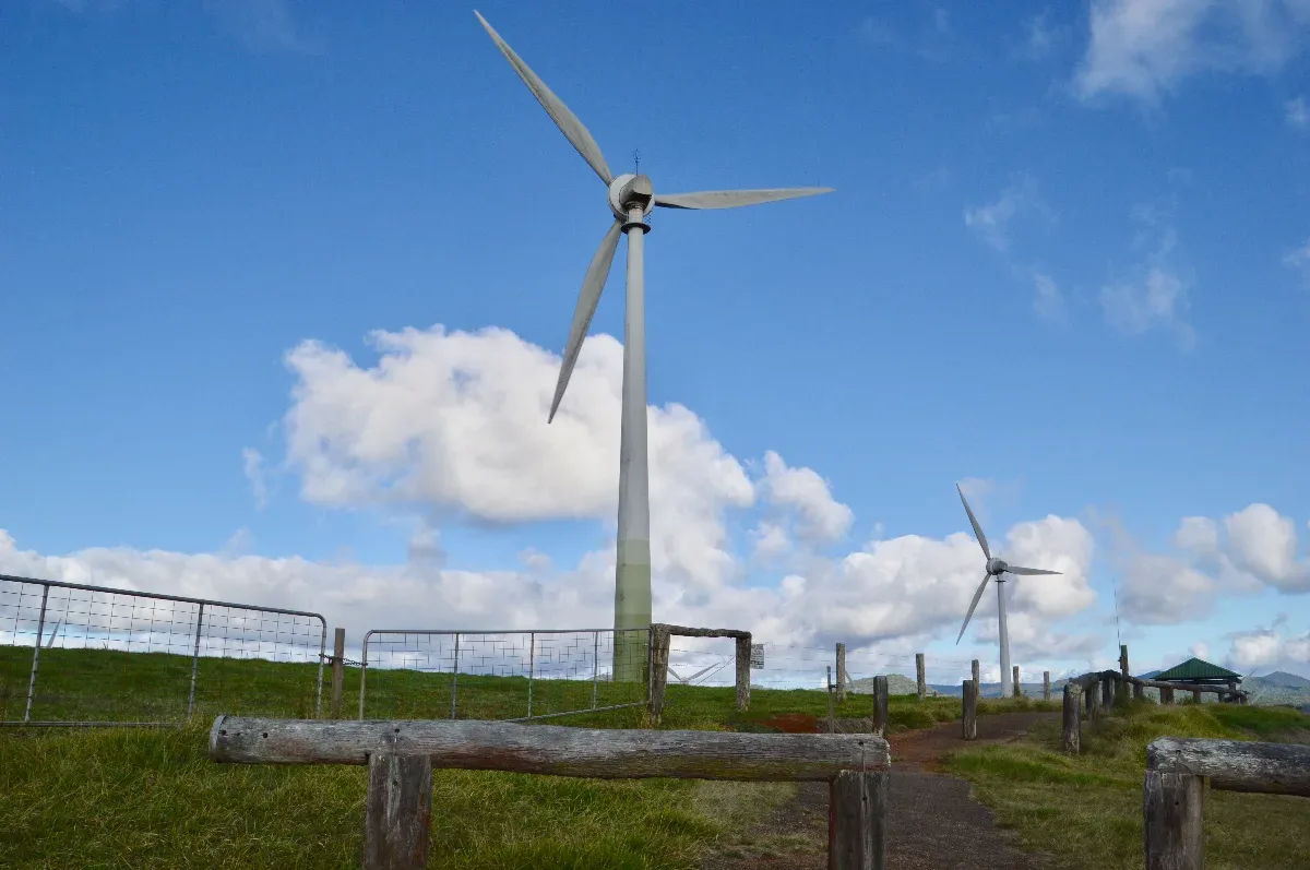 A closer view of the windmills towering above the countryside.