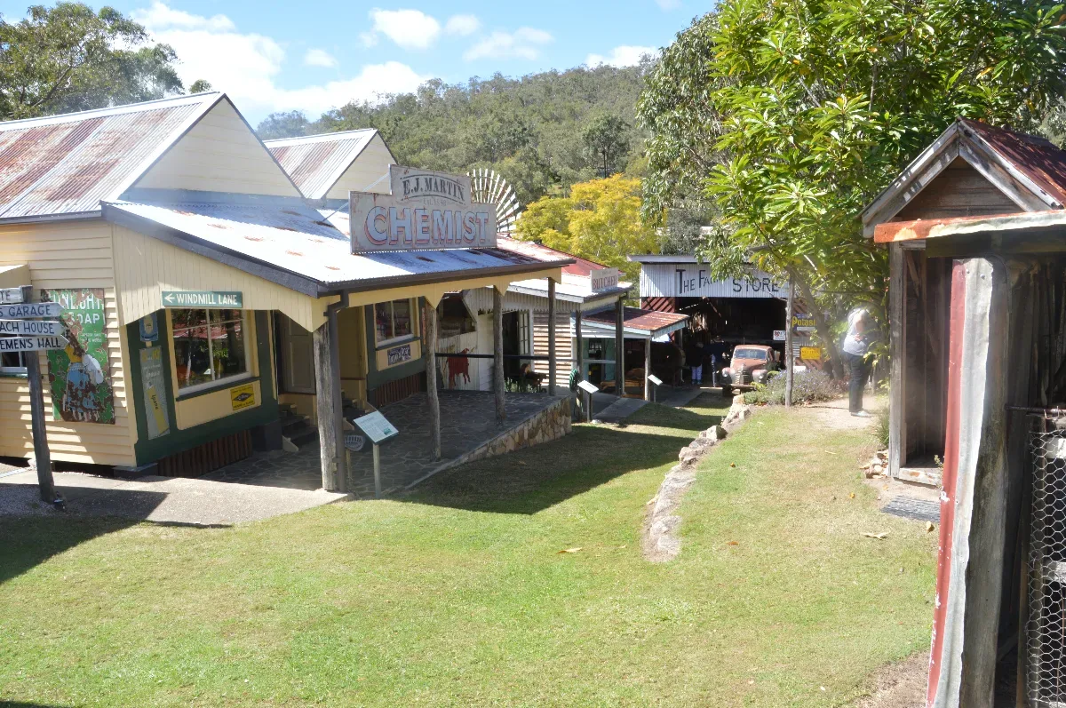 A street scene within the village, highlighting the diverse range of shops and businesses.