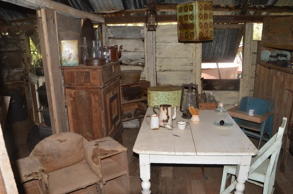 A peek inside a historic home, complete with authentic furnishings and a touch of rustic charm.