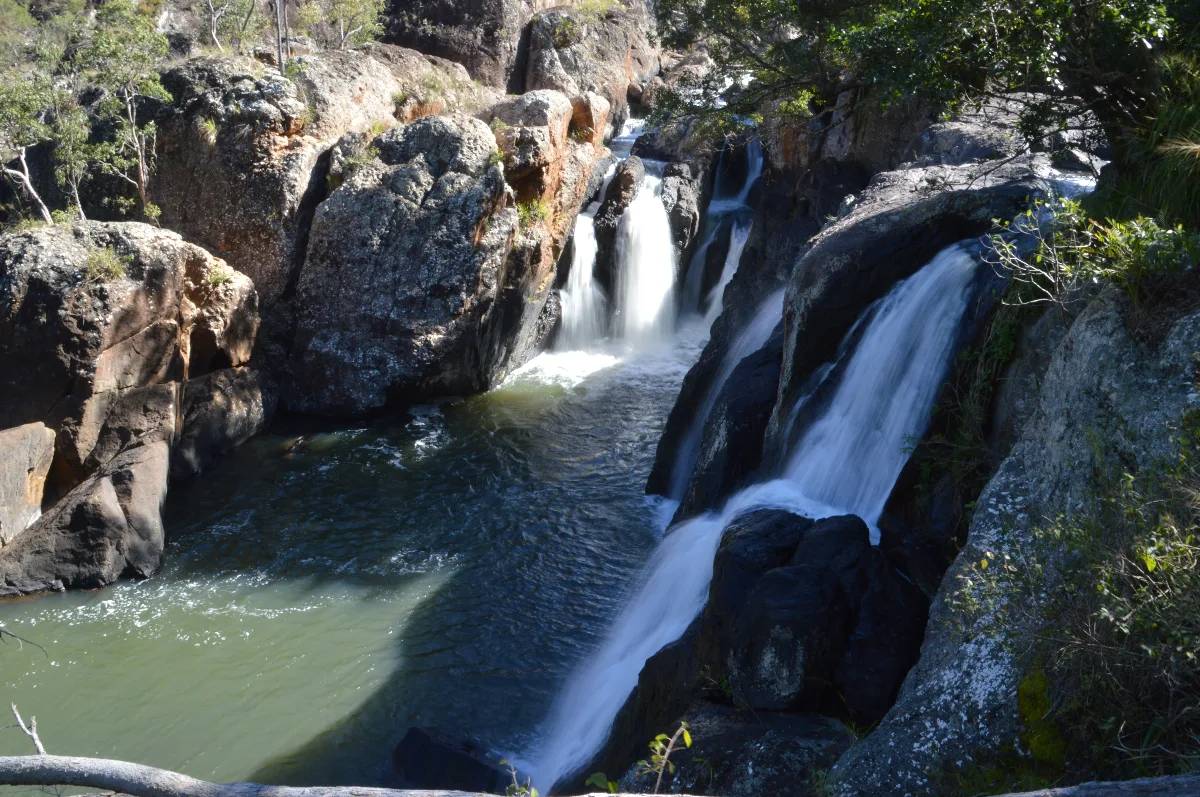 A view overlooking the falls with a picturesque landscape.