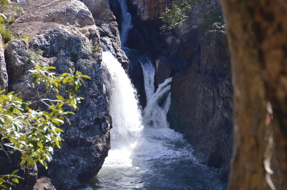 A smaller cascade along the Millstream River, framed by the rugged volcanic rock.