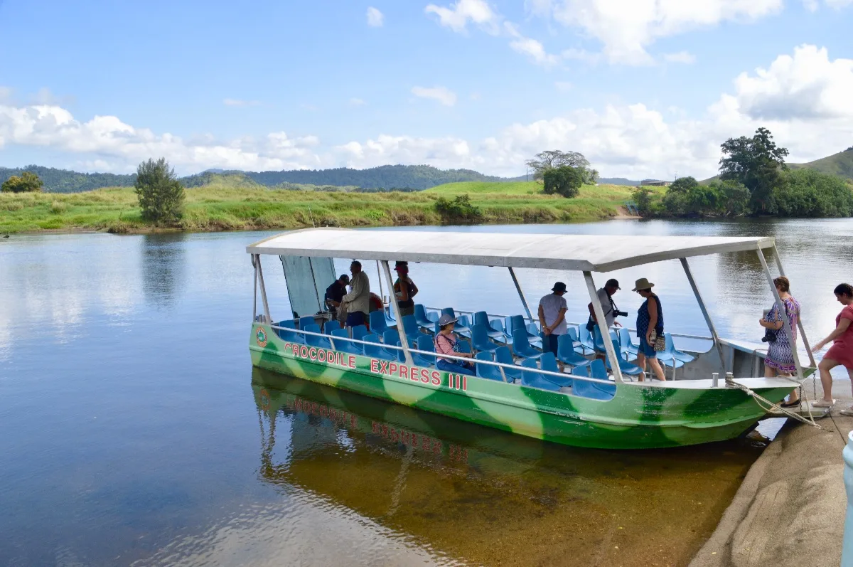 The lush rainforest lining the Daintree River creates a stunning backdrop.