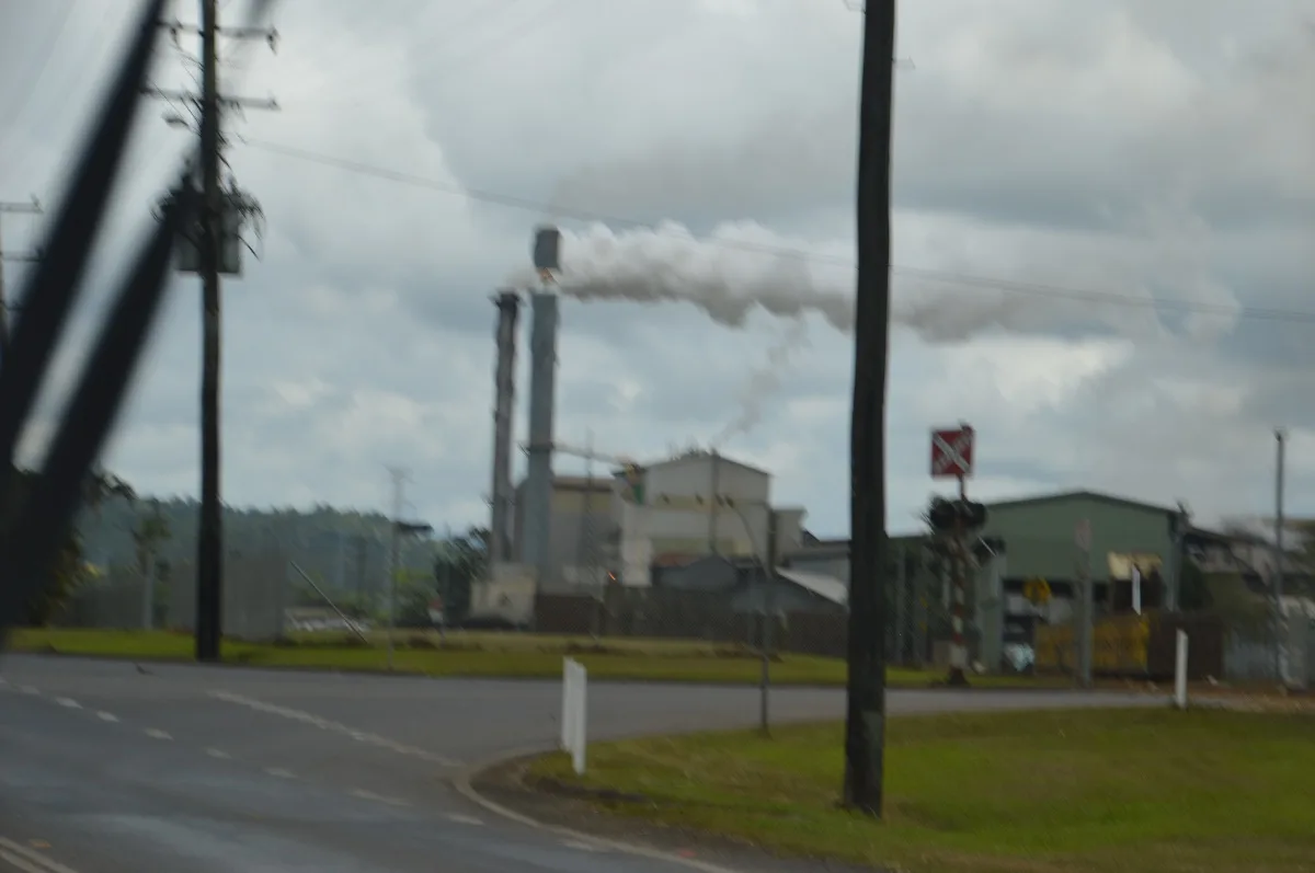 The local sugar mill. A constant plume of steam rises from it's many towers.