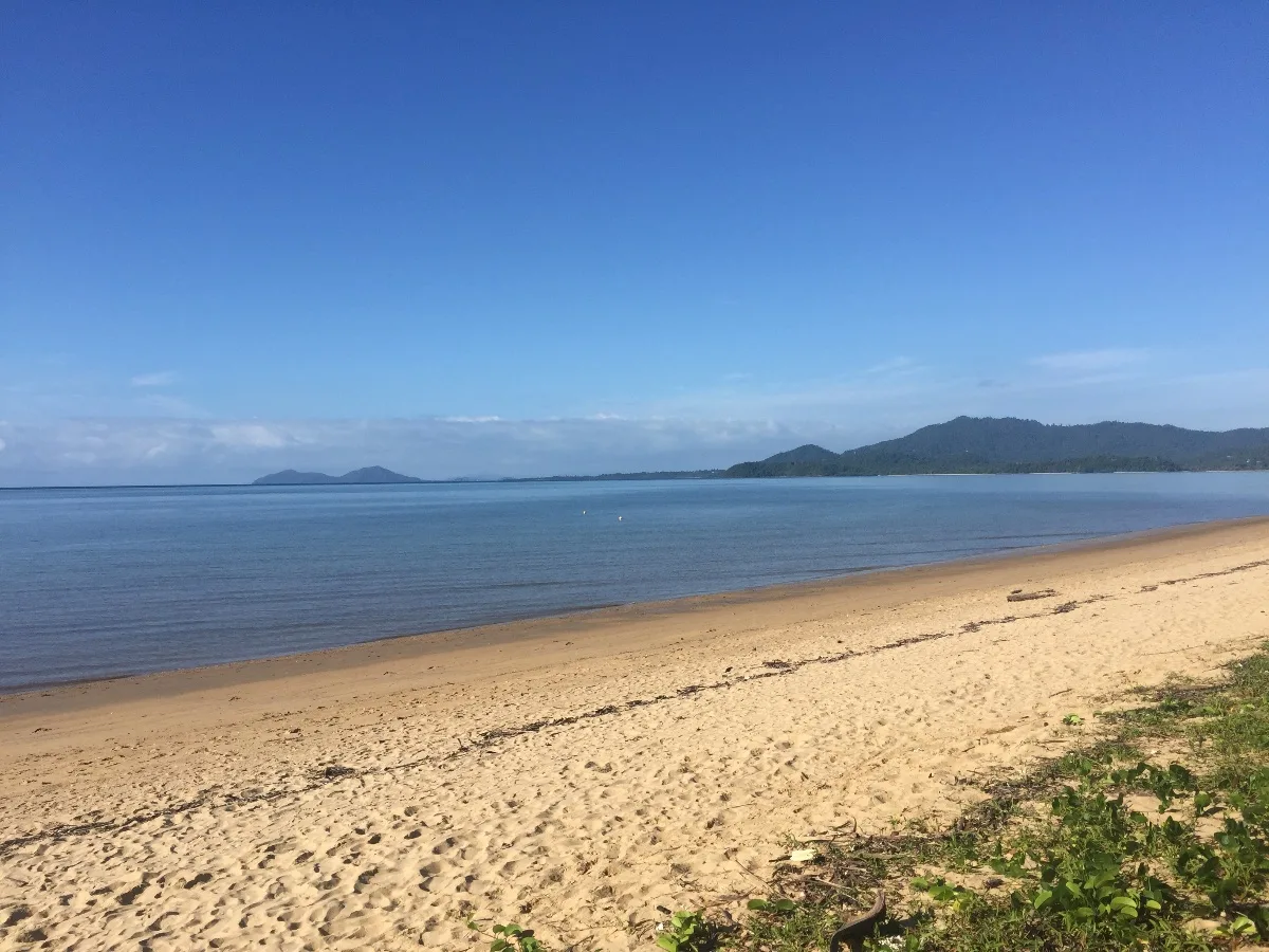 The tranquil expanse of Kurramine Beach, a welcoming sight after a day of travel.