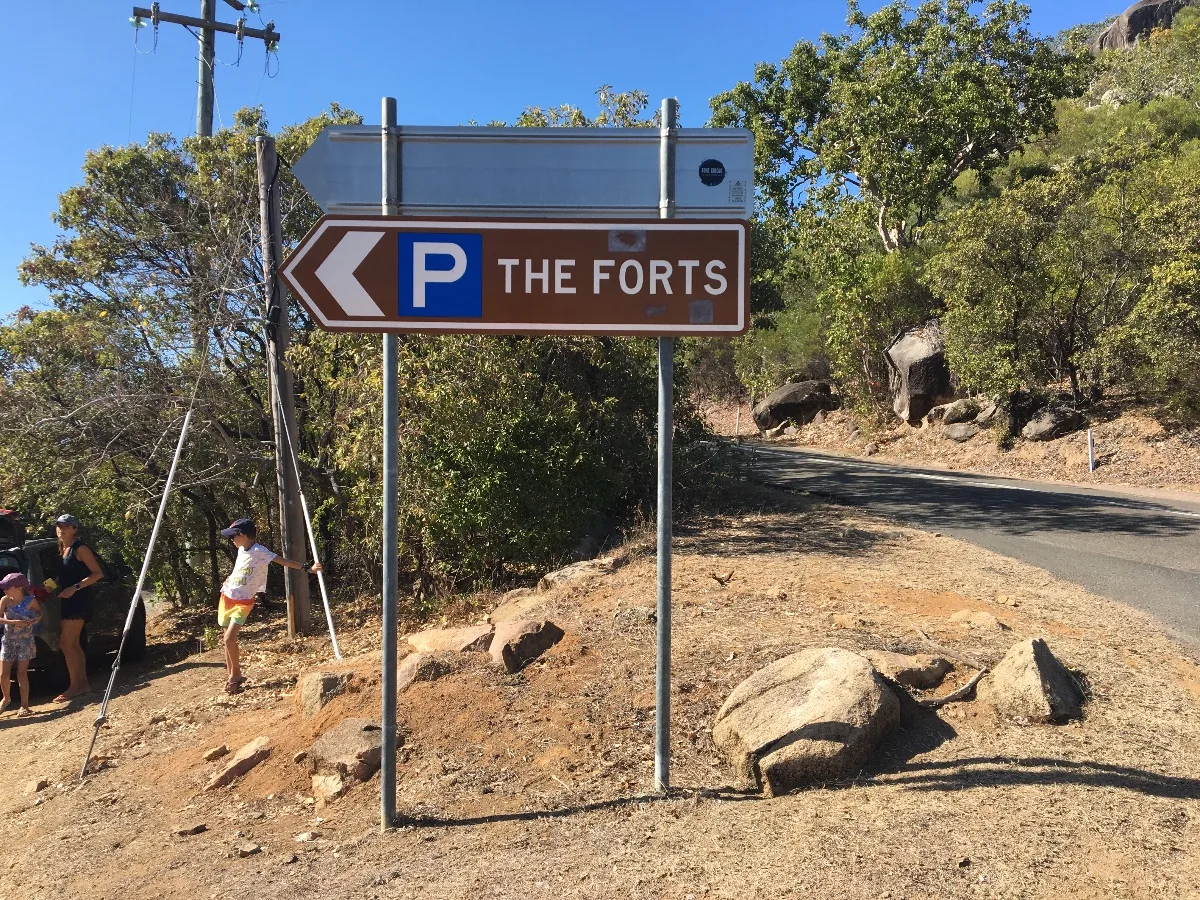 The sign points the way to a climb into history at The Forts.