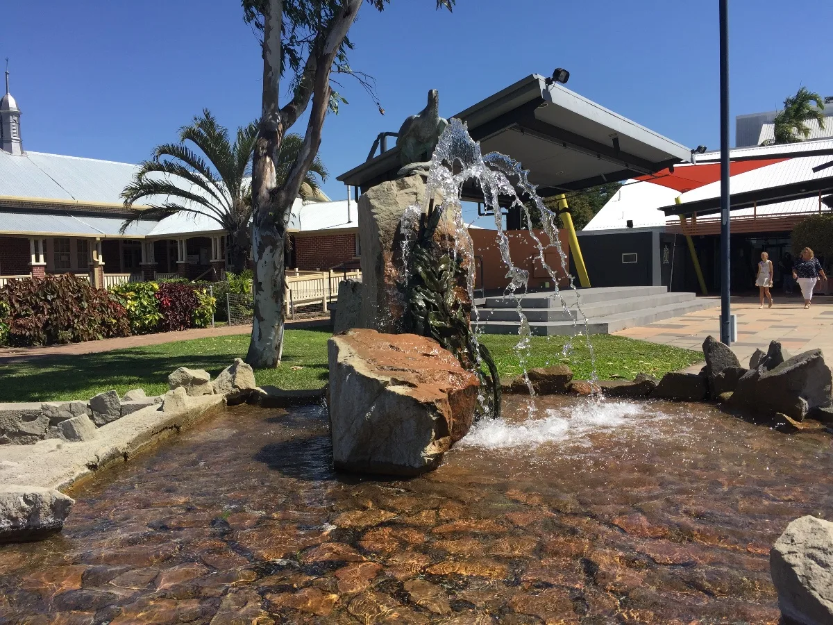 A charming water feature in the town square of Ayr, a welcome sight on a warm day.
