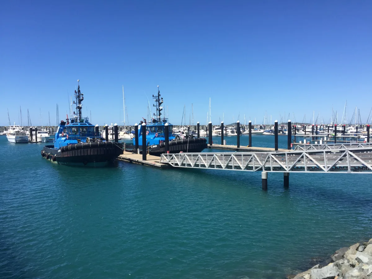 A pair of tugboats rest at the Slade Point marina.