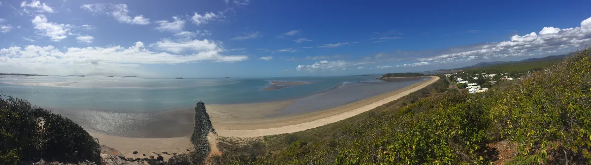 A panoramic view of Keppel Sands, showcasing the town stretching along the coastline.