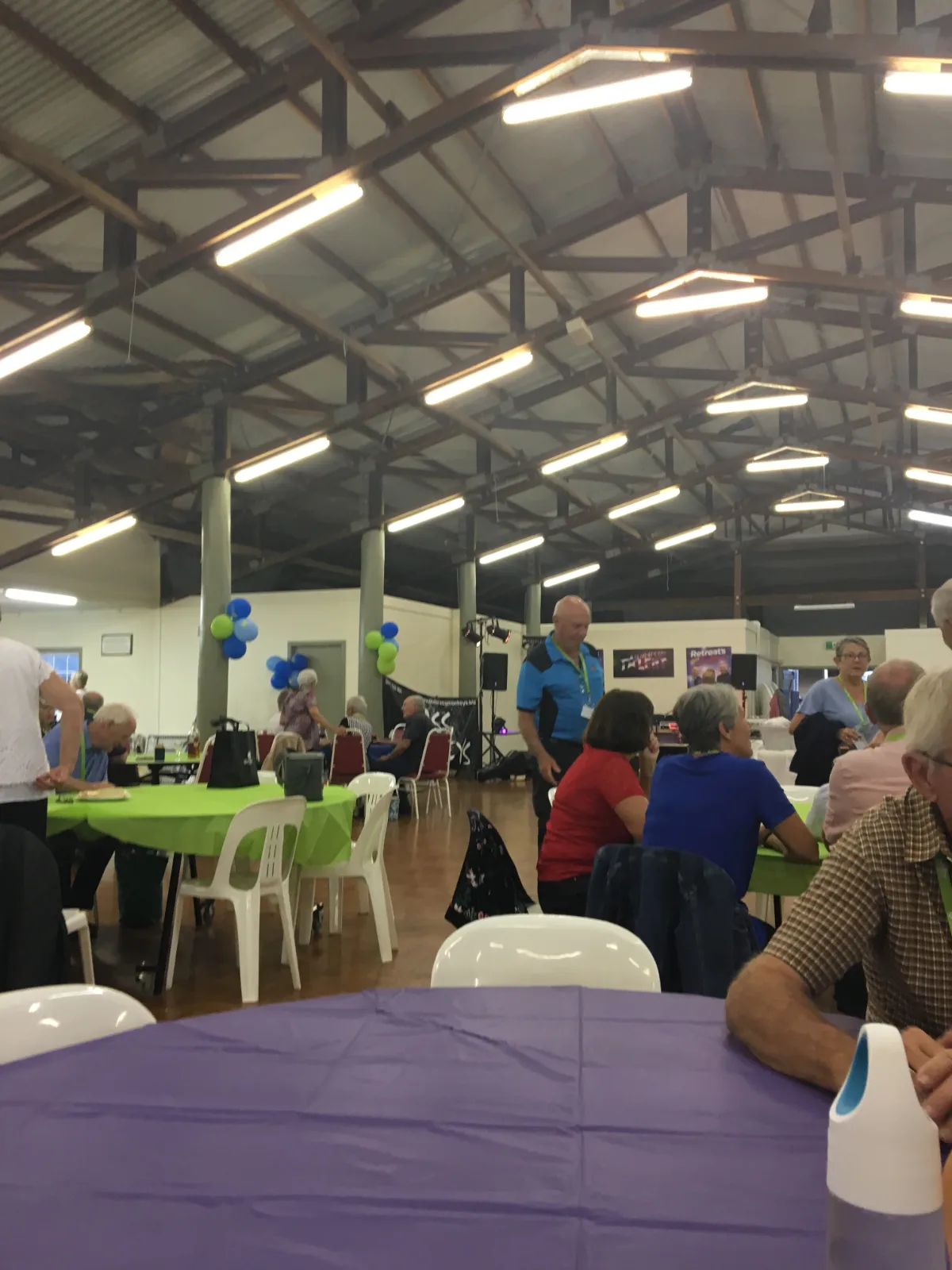 The Maryborough rally hall in full quiz night swing, a symphony of colourful tables and determined faces.