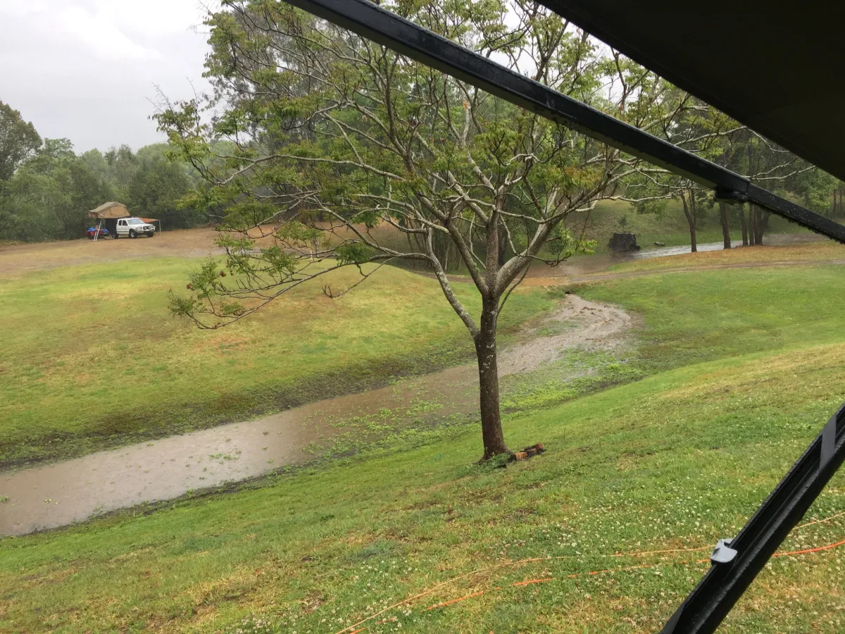 Our campsite turns into a temporary lake after an intense downpour.