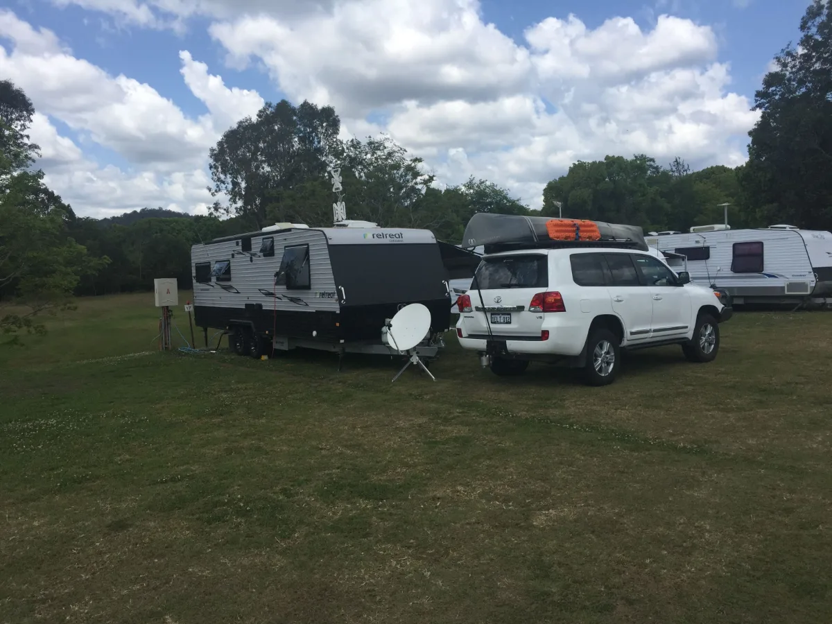 Home sweet home, for now. Our caravan nestled comfortably in our Sunshine Coast site.