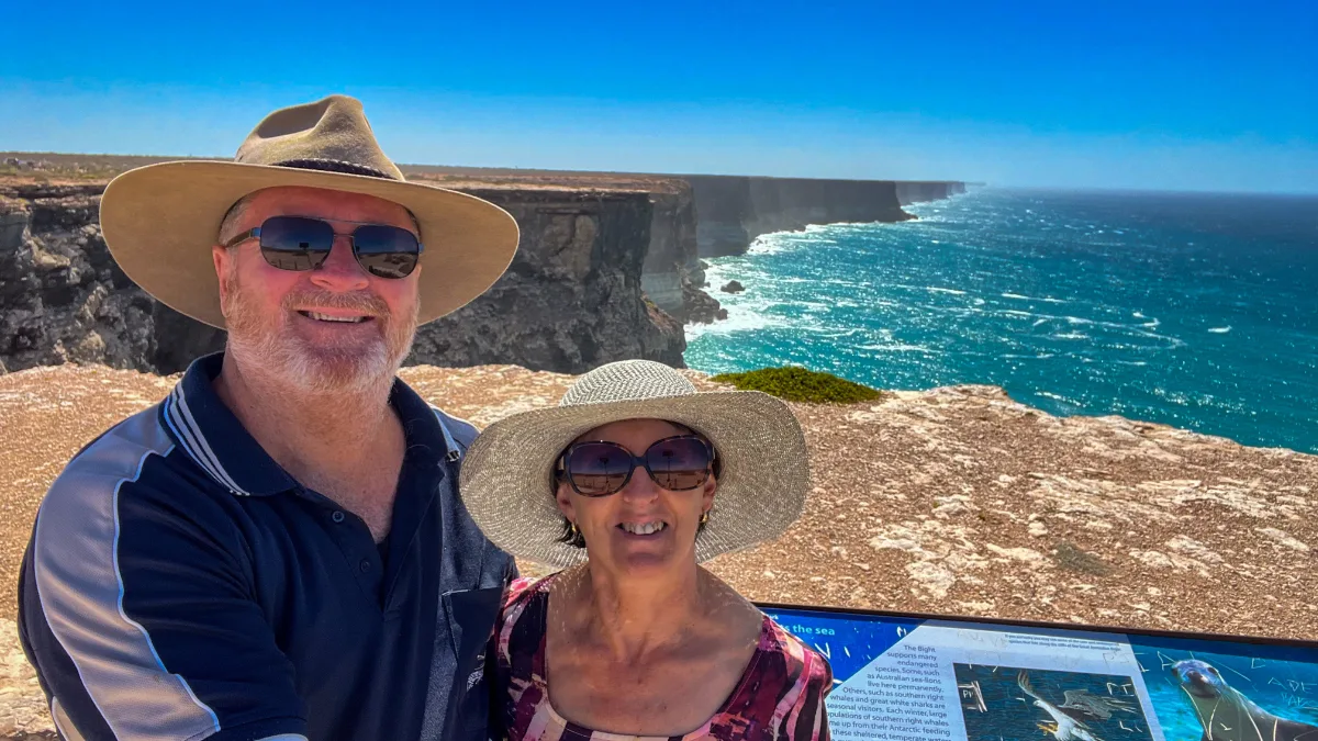 Two happy travelers at Bight Lookout No. 1, enjoying the stunning views over the Great Australian Bight.