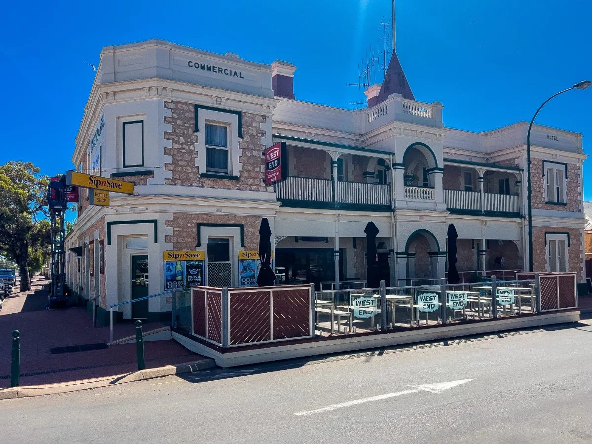 The Commercial Hotel, complete with an inviting outdoor patio area.