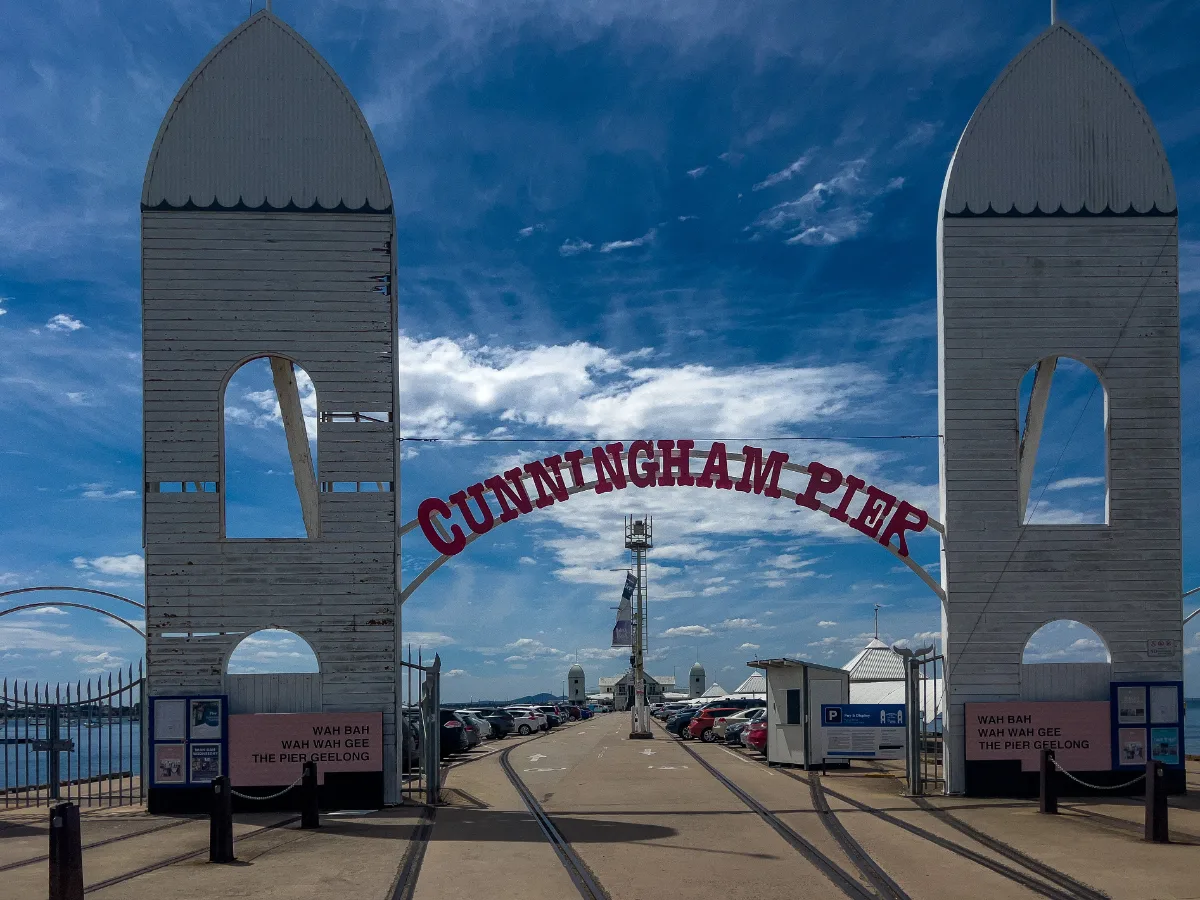 The ornate archway of Cunningham Pier, a striking landmark in Geelong, announces the pier's presence.