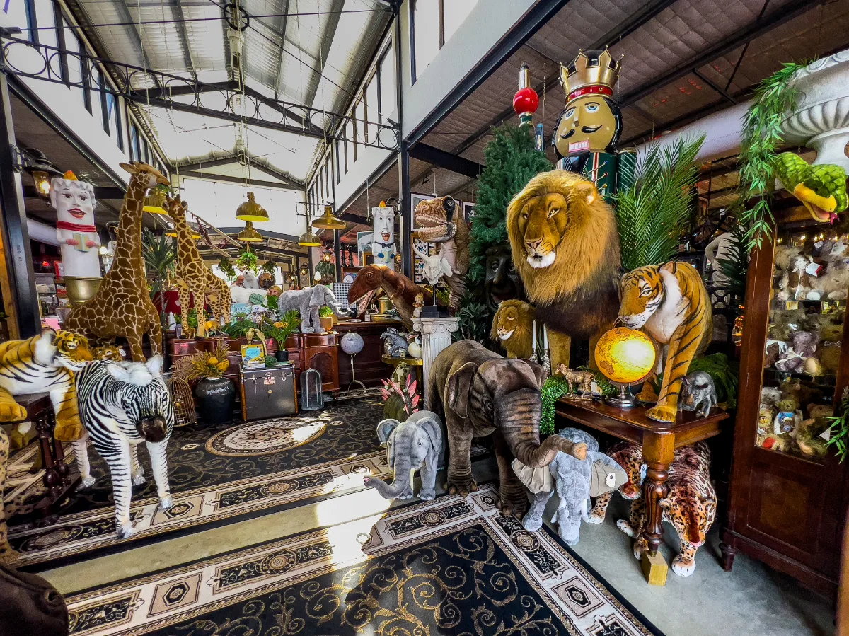 A menagerie of stuffed animals fills one of the rooms, from zebras to giraffes to lions.