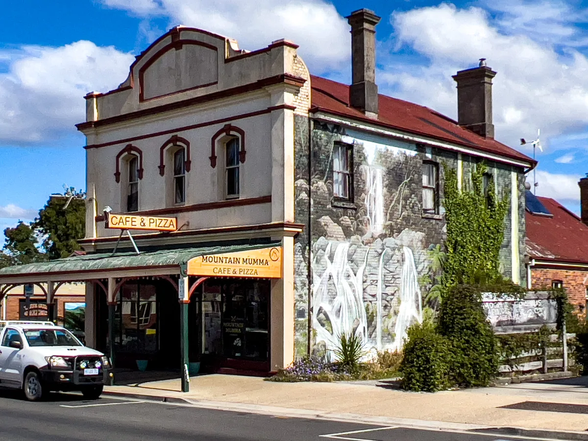 Even cafes get in on the mural action, like this one showcasing a cascading waterfall.