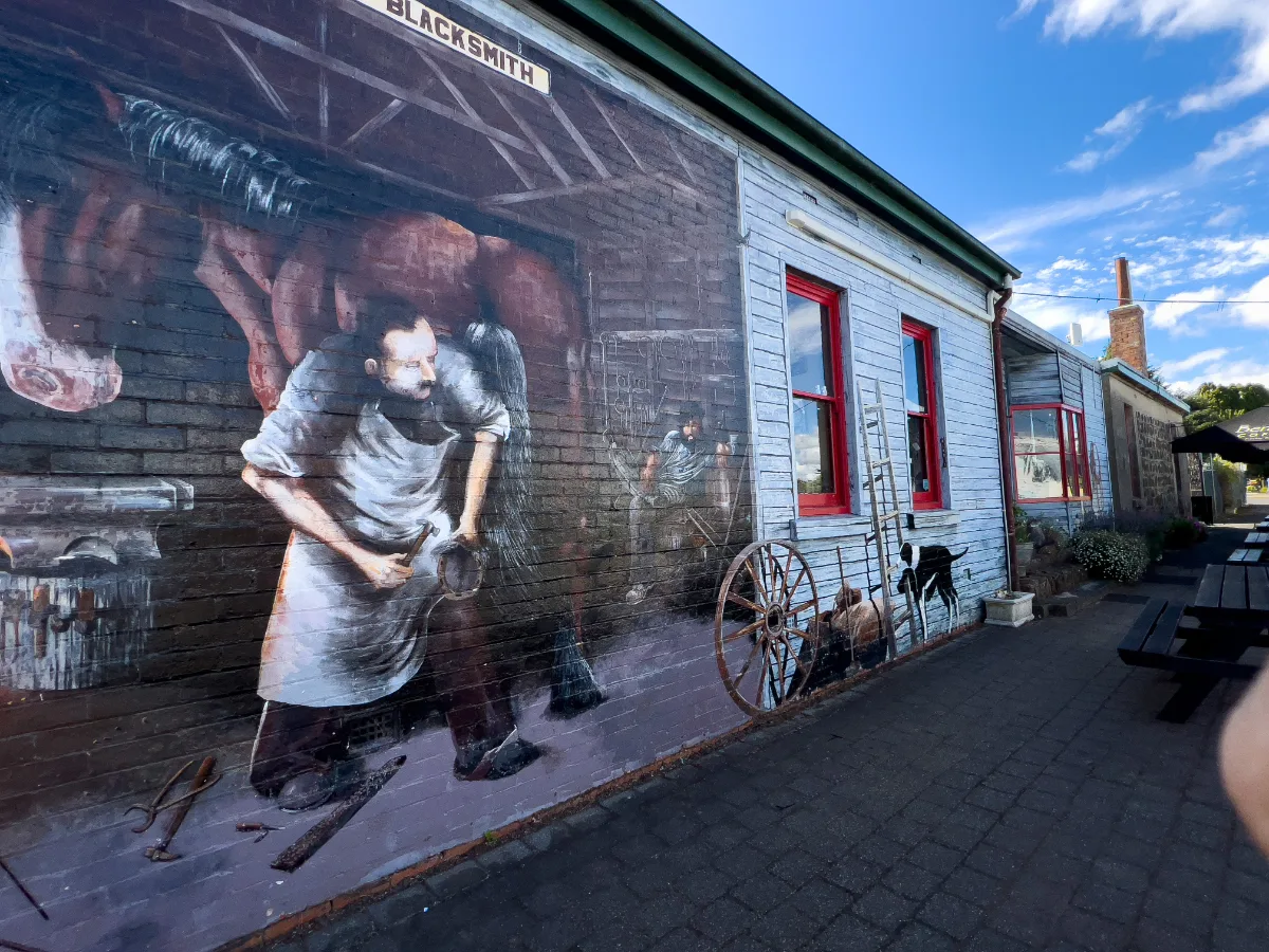 A blacksmith mural captures the essence of a traditional trade.