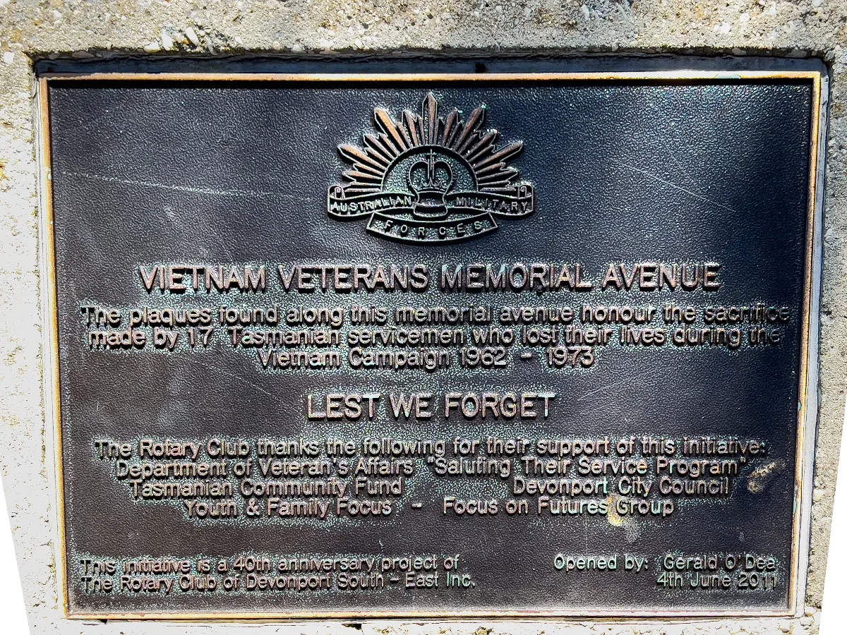 A close-up of a plaque honoring fallen Tasmanian servicemen in the Vietnam Veterans Memorial Avenue.