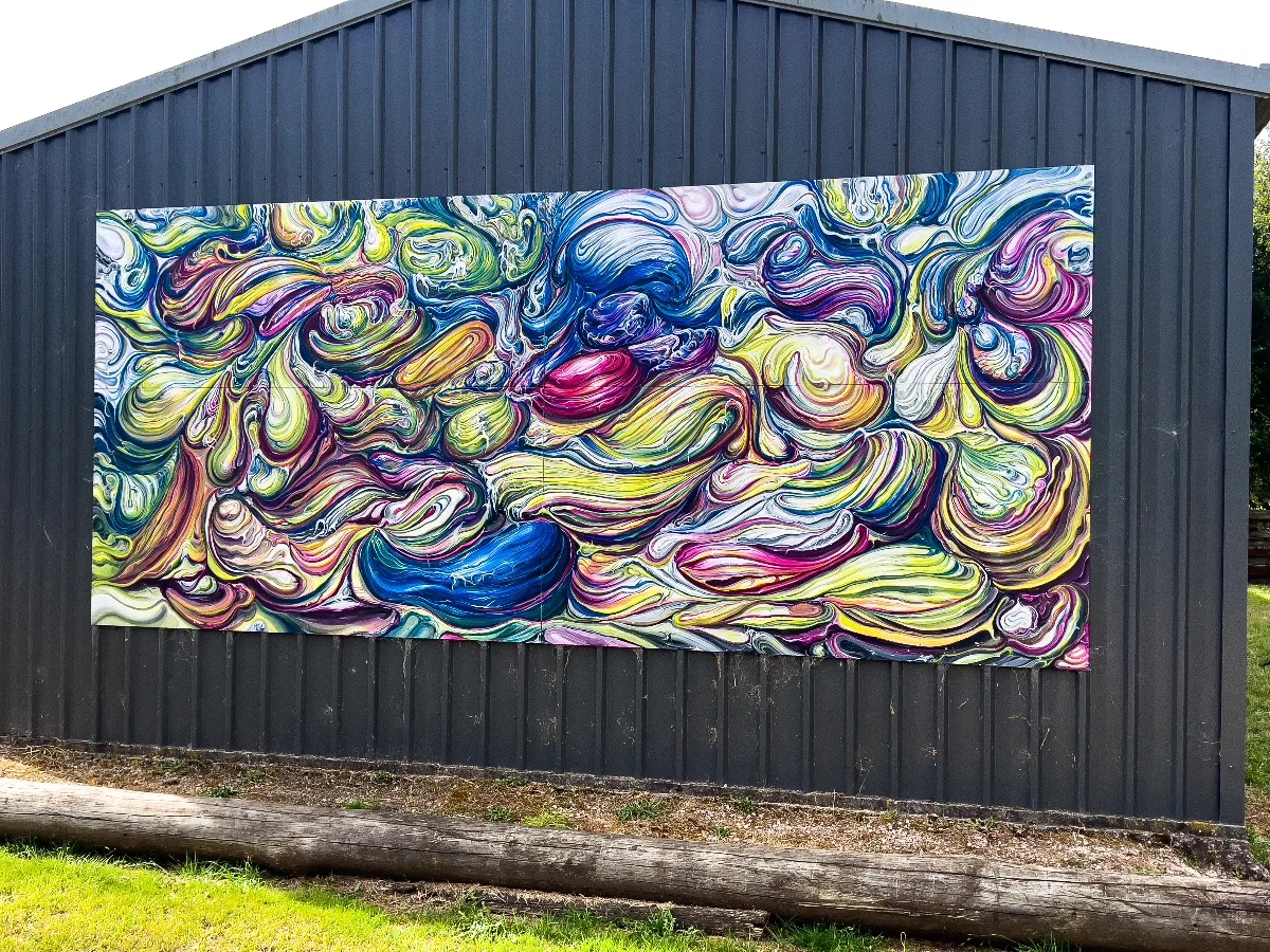 A closer look at the riot of colours and swirling patterns of the large mural in Sheffield.