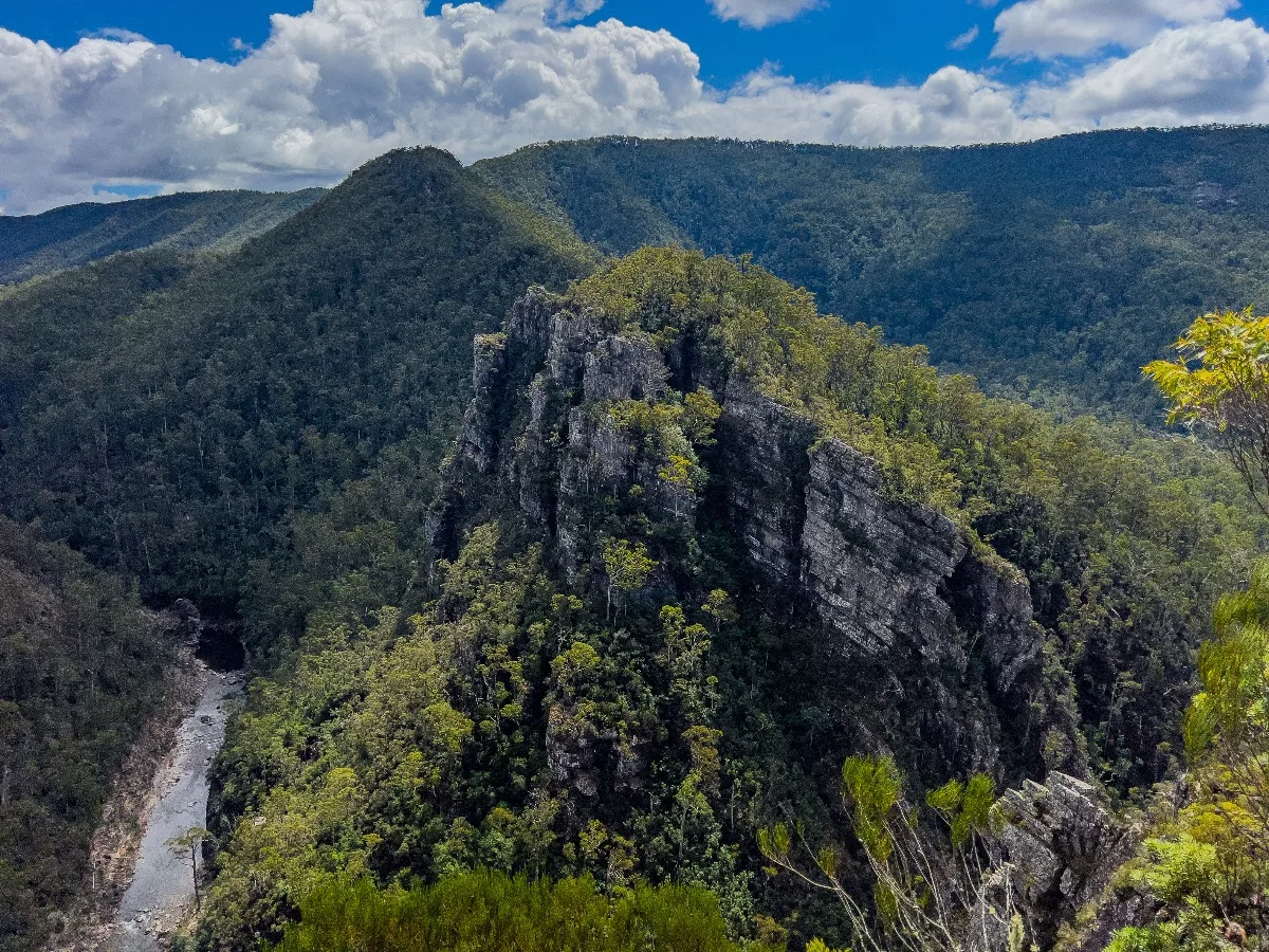 The massive limestone face of the Alum Cliffs standing tall above the Mersey River valley.