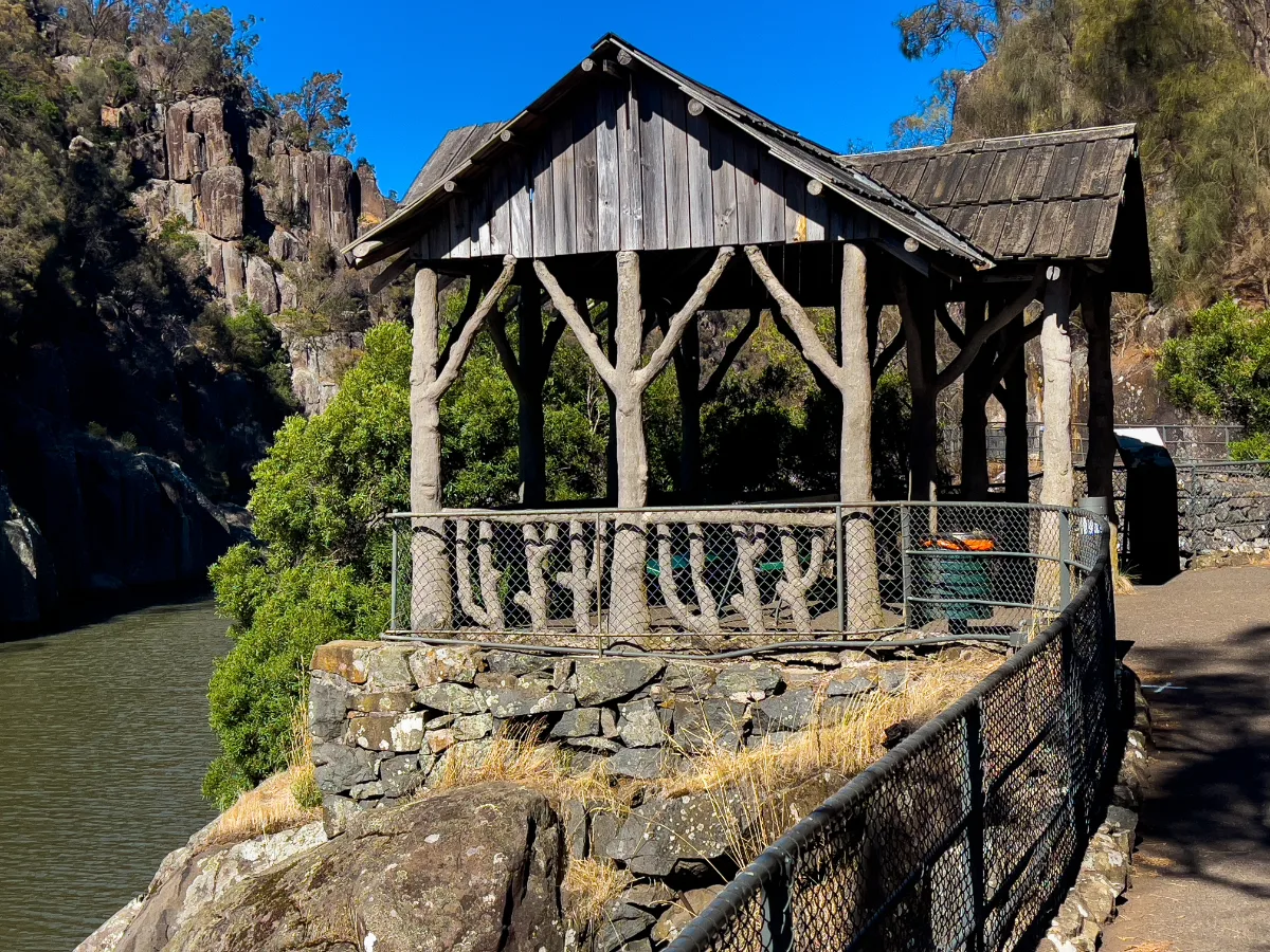 This clever shelter uses natural timber to blend right into the surrounding bushland.