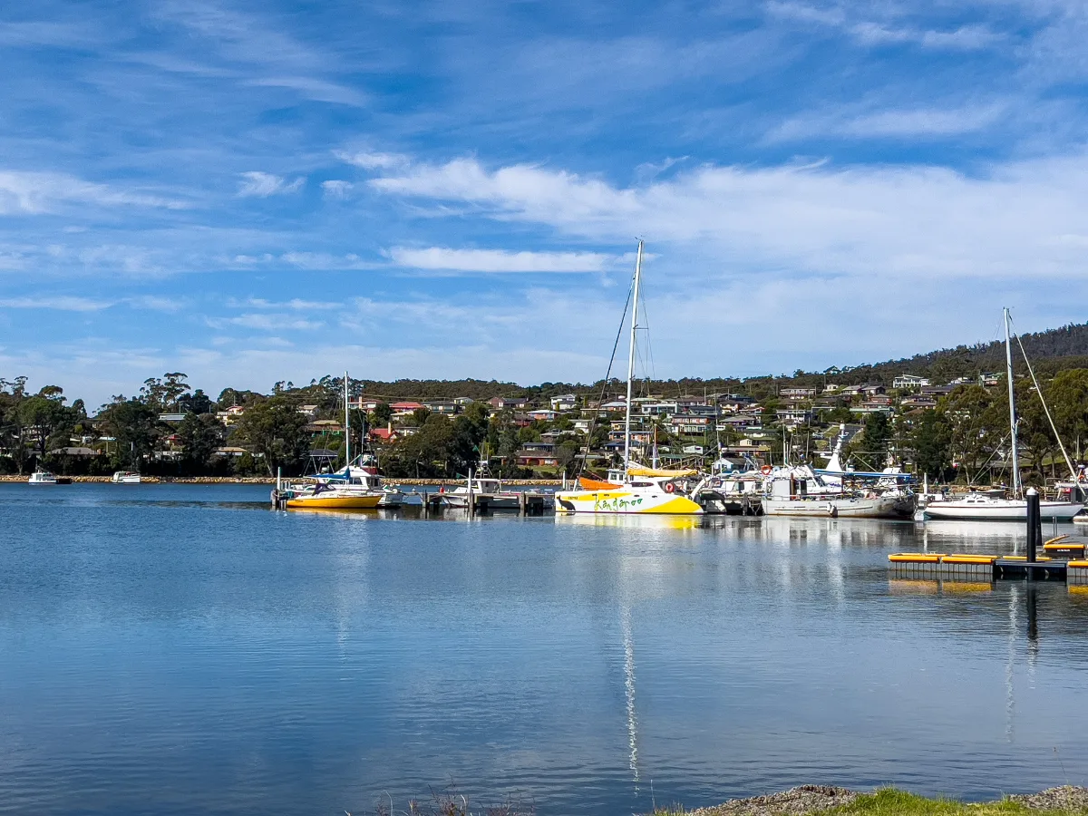 A beautiful view of the boats resting in the calm waters of the bay.