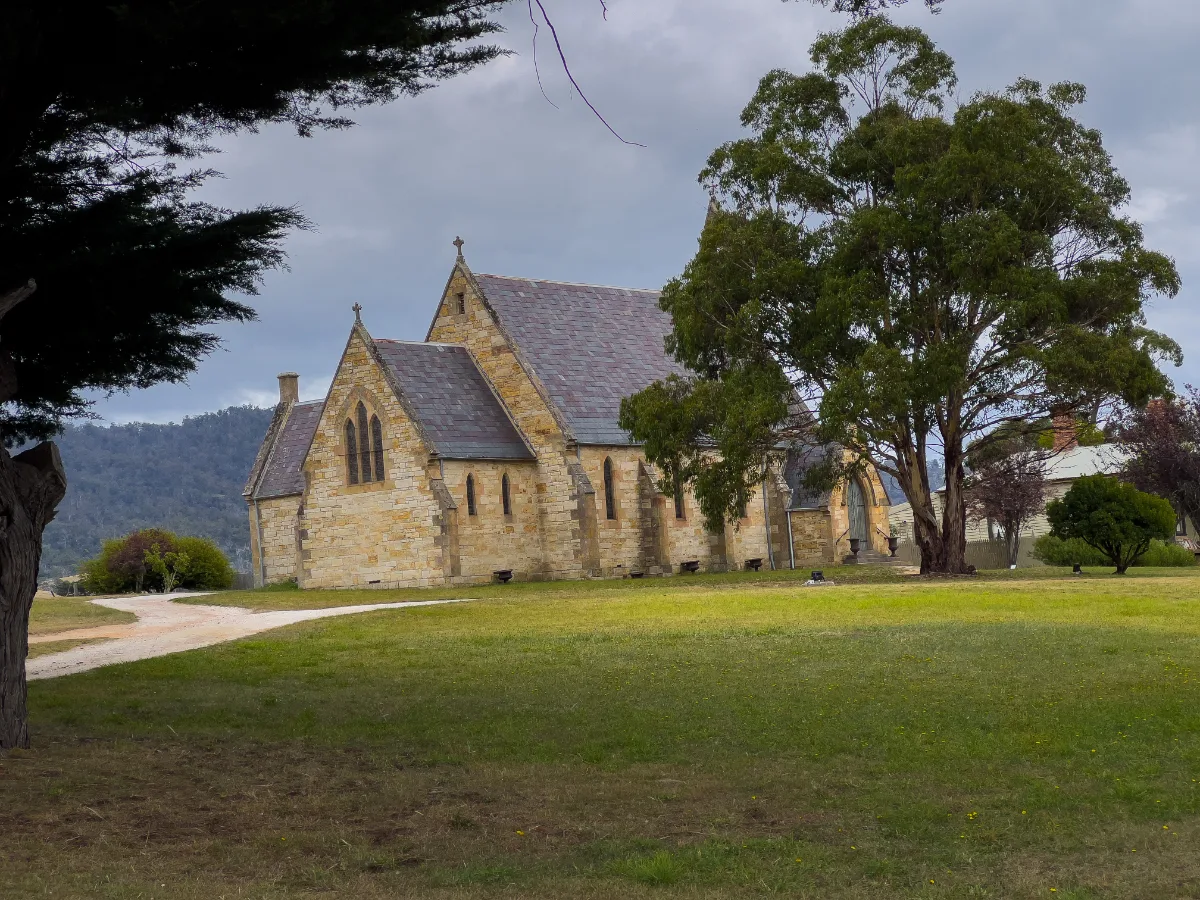 The old stone church resting peacefully at the foot of the Fingal Valley hills.