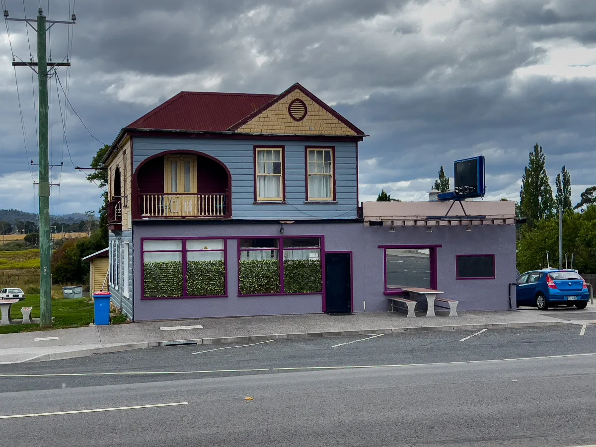A quirky purple and blue shopfront showing off the town's colourful personality.