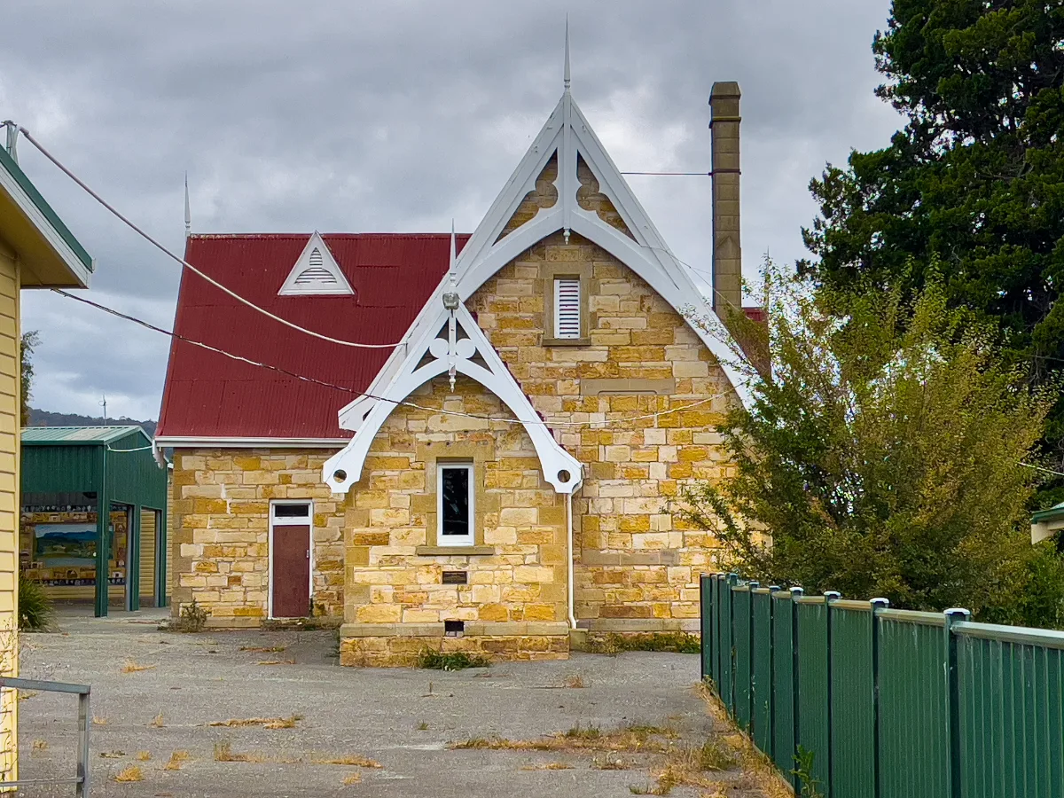 The beautiful stone cottage with its intricate white woodwork that Lisa absolutely loved.