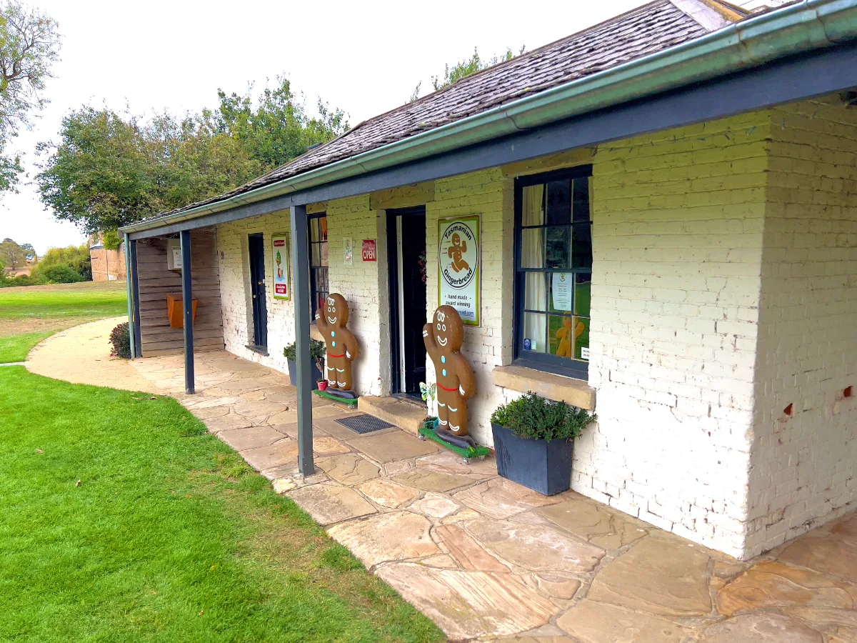 A couple of giant gingerbread men keeping watch over the lolly shop.