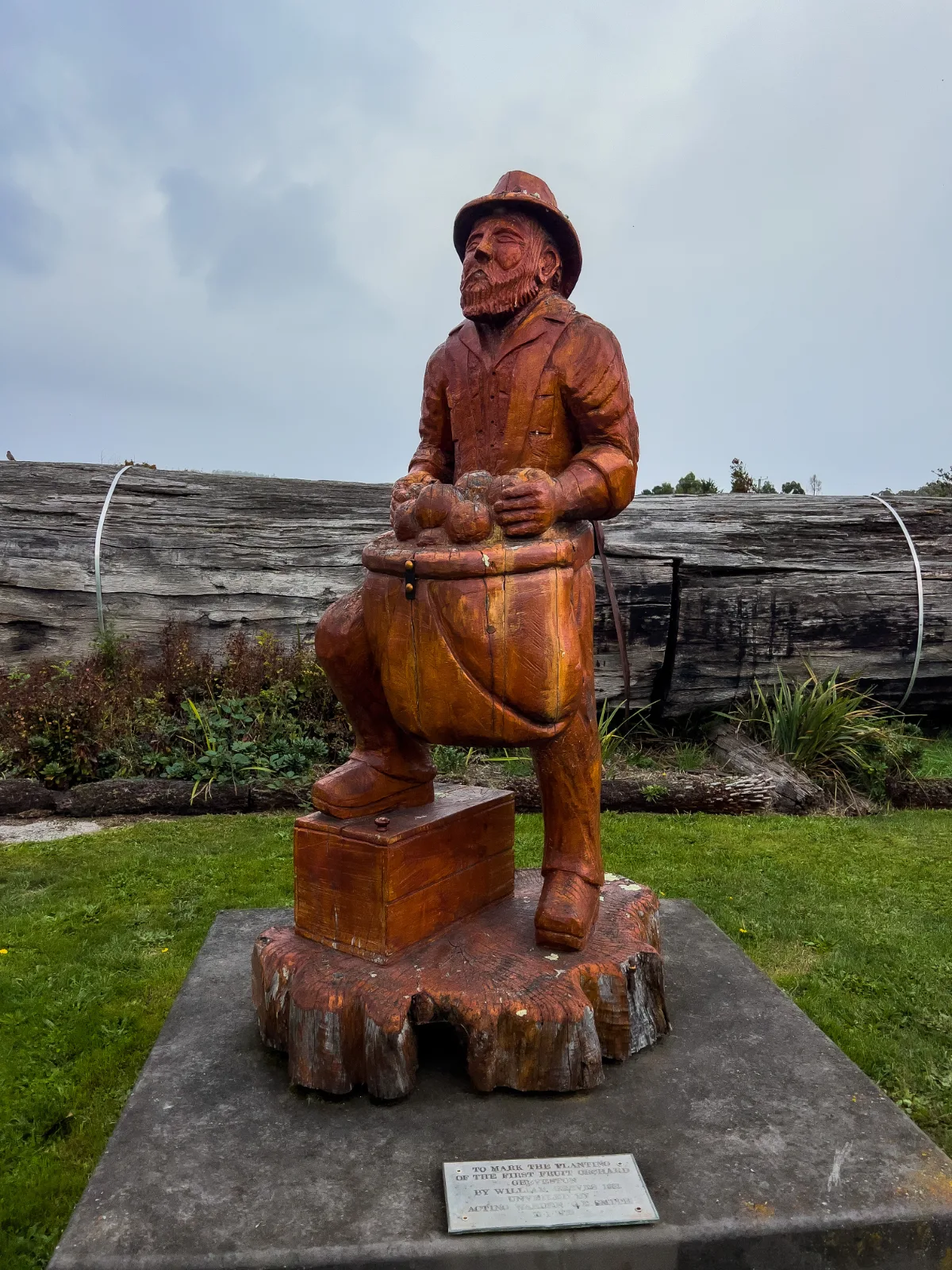 A beautifully detailed carving of a local apple picker, a real testament to the town's orchard history.