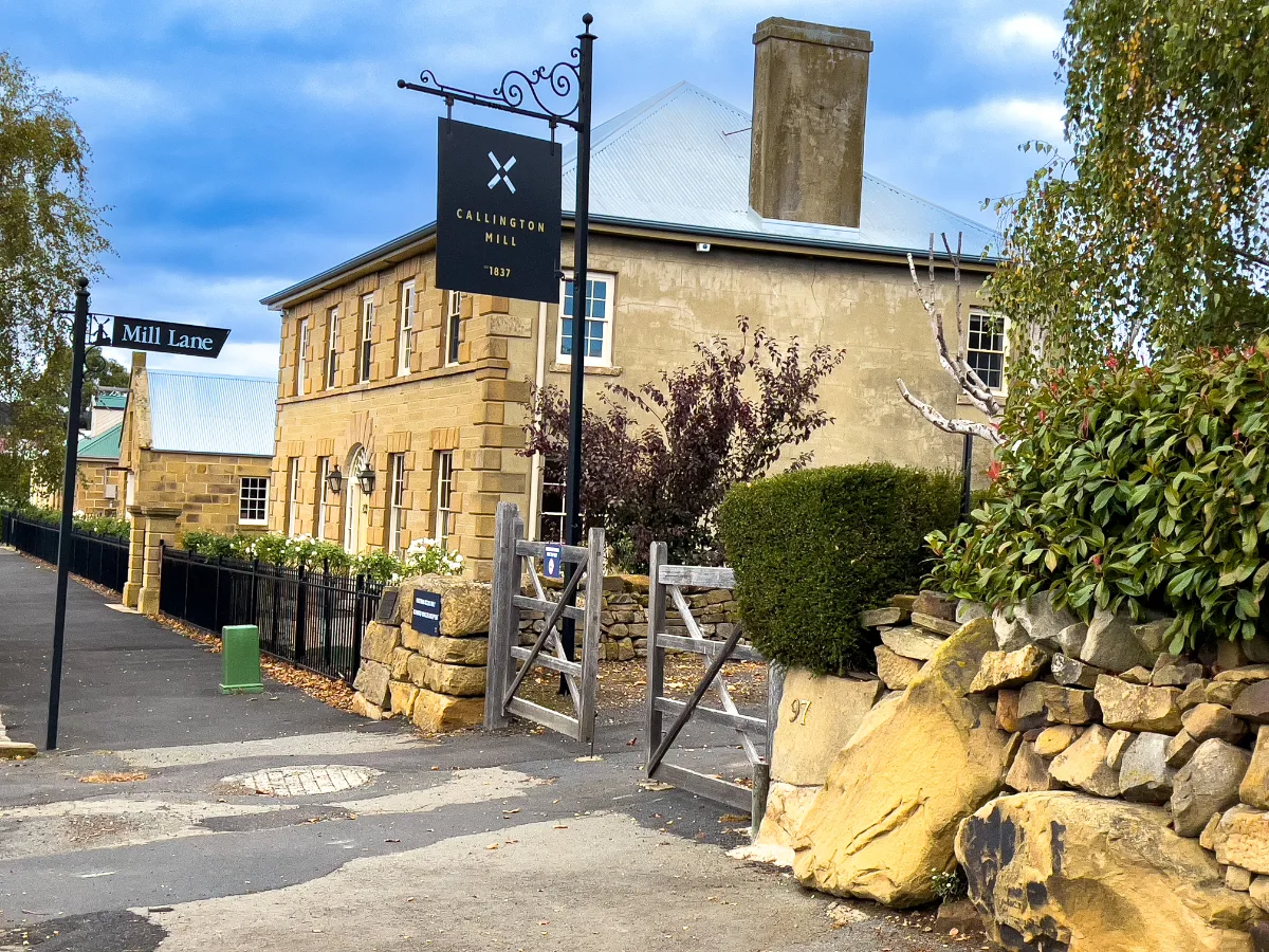 The historic Callington Mill standing tall at the end of Mill Lane under a moody Tasmanian sky.