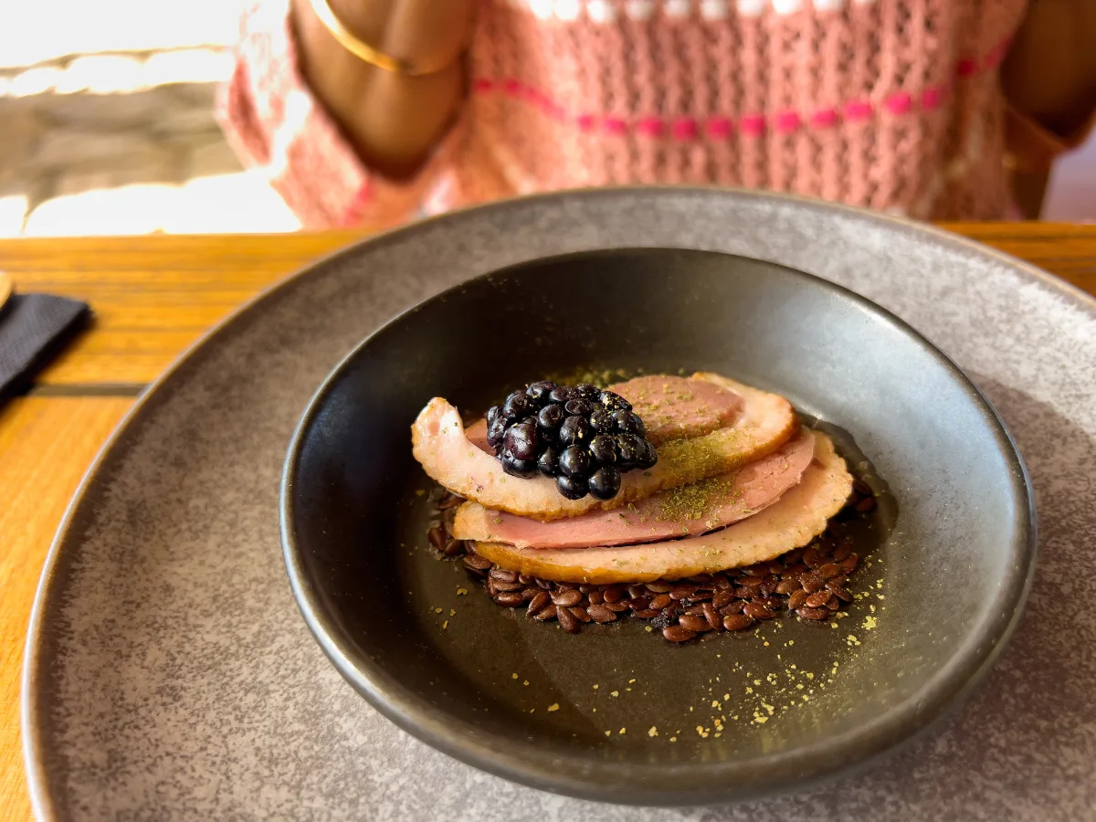 Steve really enjoyed this perfectly prepared duck dish, topped with a generous serving of dark berries.