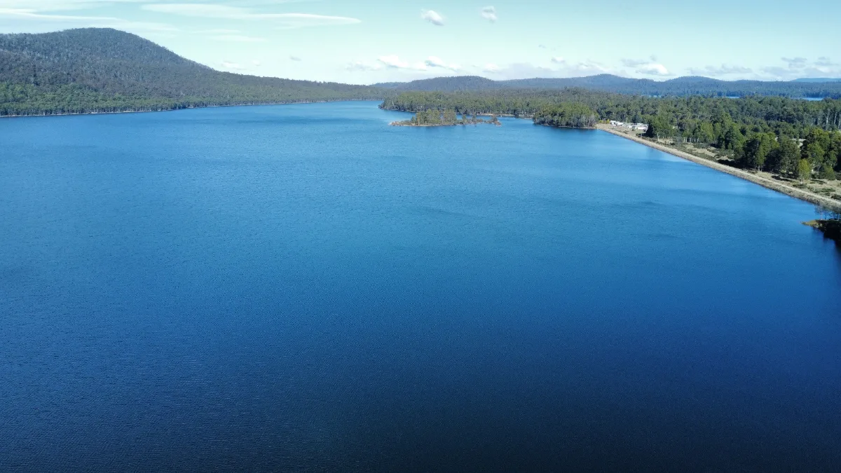 An aerial view of the deep blue waters of Brady’s Lake from our campsite.