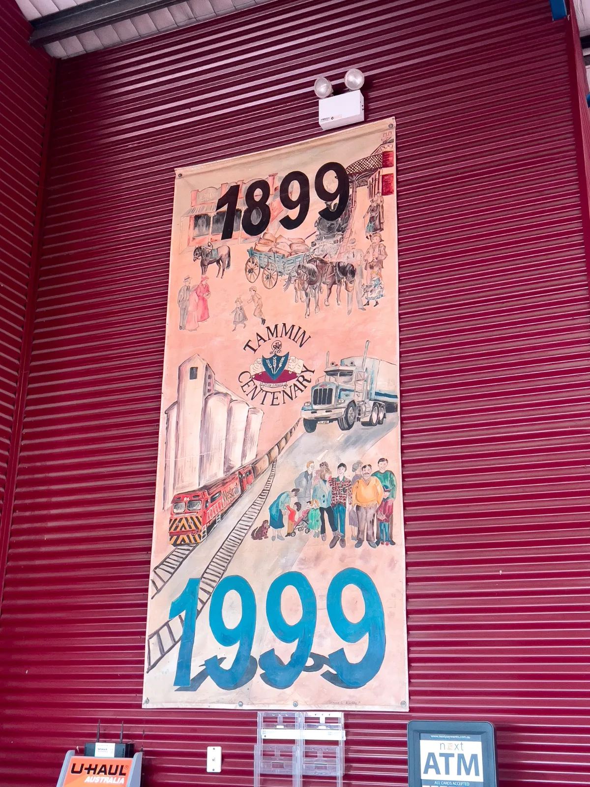 A Tammin Centenary banner tells a visual story of the Shire's first hundred years.