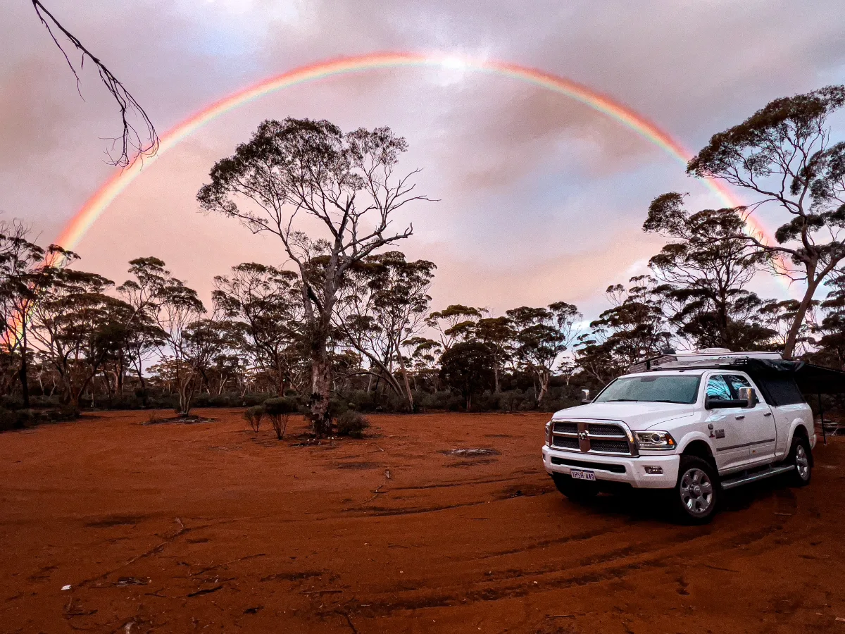 A rainbow arches over our campsite, proof that even in the remote outback, nature provides.