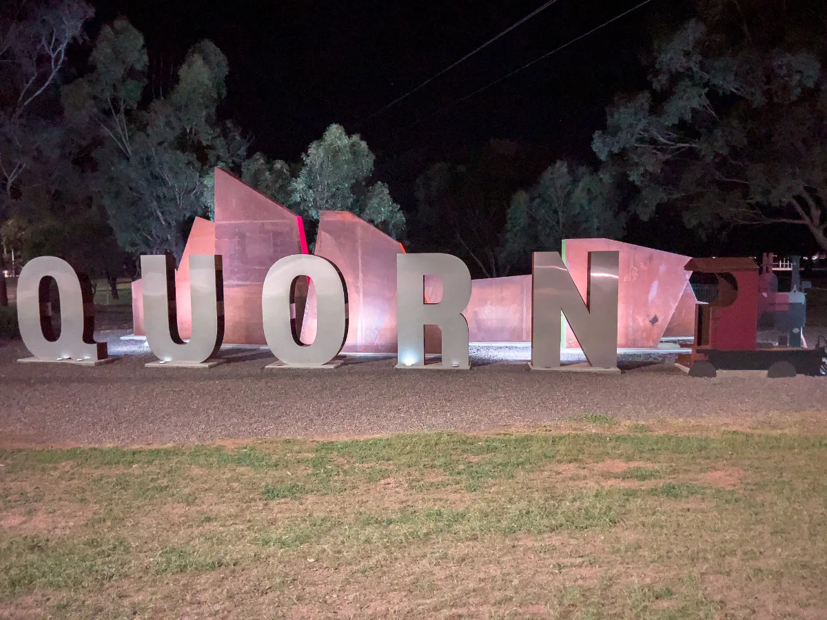 The 'Quorn' sign at night.